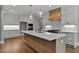Elegant kitchen featuring a large island, custom cabinets, and professional-grade appliances at 3923 Cedar Knolls Dr # 12, Youngsville, NC 27596