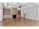 Cozy living area showcasing a stone fireplace, stylish built-ins, and coffered ceilings at 3923 Cedar Knolls Dr # 12, Youngsville, NC 27596
