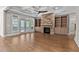Spacious living room featuring a stone fireplace, built-in shelving, and coffered ceilings at 3923 Cedar Knolls Dr # 12, Youngsville, NC 27596