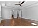 Spacious main bedroom with hardwood floors and access to the ensuite bathroom and walk-in closet at 3923 Cedar Knolls Dr # 12, Youngsville, NC 27596