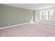 Bright bedroom featuring neutral carpet, natural light and serene atmosphere for relaxation and rest at 3935 Willow Gate Way, Knightdale, NC 27604