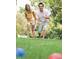 Residents playing bocce ball on a community lawn at 3935 Willow Gate Way, Knightdale, NC 27604