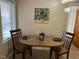 Small dining area with table and chairs at 404 W Ninth St, Siler City, NC 27344