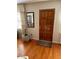 Hardwood floors and wood door entryway at 404 W Ninth St, Siler City, NC 27344