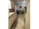 Kitchen with white cabinets and tile floor at 404 W Ninth St, Siler City, NC 27344
