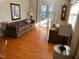 Bright living room with hardwood floors and large windows at 404 W Ninth St, Siler City, NC 27344