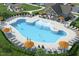 Resort-style pool with ample lounge chairs and a clubhouse at 436 Autumn Moon Dr, Zebulon, NC 27597