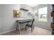 Home office with a desk, chair, and built-in shelving at 436 Autumn Moon Dr, Zebulon, NC 27597