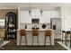 Open-concept kitchen featuring a breakfast bar, modern appliances, and ample cabinet space, perfect for entertaining at 5302 River Reach Dr, Raleigh, NC 27616
