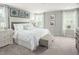 Large main bedroom with king-size bed and en-suite bathroom at 600 Mohinda Way, Willow Springs, NC 27592