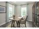Home office with wooden desk and built-in bookcases at 600 Mohinda Way, Willow Springs, NC 27592