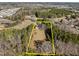 Aerial view of property showing large lot and surrounding area at 6516 Battle Bridge Rd, Raleigh, NC 27610
