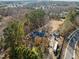 Aerial view showcasing house, detached garage, and yard at 6516 Battle Bridge Rd, Raleigh, NC 27610