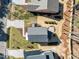 Aerial view of multiple houses in the neighborhood with manicured lawns and landscaping at 713 Heidelberg St, Durham, NC 27704