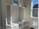 Bright mudroom featuring custom built-ins and shelving, providing ample storage and organization at 713 Heidelberg St, Durham, NC 27704