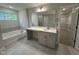 Bathroom featuring double vanity with tub and shower at 752 Portland Rose Dr, Knightdale, NC 27545