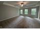 Bedroom featuring neutral colored carpet, ceiling fan, and tray ceiling at 752 Portland Rose Dr, Knightdale, NC 27545
