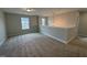 Loft area featuring neutral colored carpet and views of neighborhood at 752 Portland Rose Dr, Knightdale, NC 27545