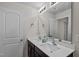 Bathroom with double vanity and dark brown cabinets at 810 Brake St, Nashville, NC 27856