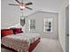 Bright bedroom with a double bed and ceiling fan at 810 Brake St, Nashville, NC 27856