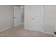 Spacious bedroom with carpet and doors at 810 Brake St, Nashville, NC 27856