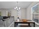 Dining area with a table and chairs, near a back door at 810 Brake St, Nashville, NC 27856