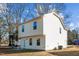 Two-story house with vinyl siding and a yard at 810 Brake St, Nashville, NC 27856