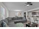 Spacious living room with a sectional sofa and a large window at 810 Brake St, Nashville, NC 27856