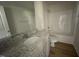 Bathroom with granite vanity and bathtub at 83 Harvest Hills Ln, Dunn, NC 28334