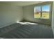 Bright bedroom with large window and grey carpet at 83 Harvest Hills Ln, Dunn, NC 28334