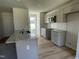 Kitchen with granite island and stainless steel dishwasher at 83 Harvest Hills Ln, Dunn, NC 28334