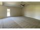 Spacious living room with carpeted floor and ceiling fan at 83 Harvest Hills Ln, Dunn, NC 28334