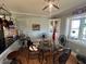 Cozy dining area with glass top table and built-in hutch at 1002 Godwin Ln, Dunn, NC 28334