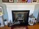White mantel fireplace with decorative accents at 1002 Godwin Ln, Dunn, NC 28334