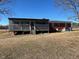 Brick ranch house with a screened porch at 1002 Godwin Ln, Dunn, NC 28334