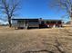 Brick ranch house with a screened porch at 1002 Godwin Ln, Dunn, NC 28334