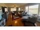 Living room with hardwood floors, sectional sofa, and chaise lounge at 1002 Godwin Ln, Dunn, NC 28334