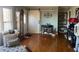 Living room with hardwood floors, fireplace, and barn door at 1002 Godwin Ln, Dunn, NC 28334