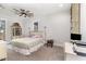 Large bedroom with ceiling fan, carpeted floor, and ample natural light at 1006 W Broad St, Dunn, NC 28334