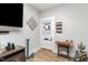 Bright entryway with vintage-style furniture and wood floors at 1006 W Broad St, Dunn, NC 28334