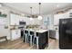 Stylish kitchen featuring white shaker cabinets and an island at 1006 W Broad St, Dunn, NC 28334