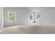 Large bedroom with vaulted ceilings and multiple windows at 1112 Middlecrest Dr, Rocky Mount, NC 27804