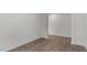 Small bedroom with wood-look floors and white walls at 1112 Middlecrest Dr, Rocky Mount, NC 27804
