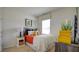 Bedroom with wooden night stand and orange bedding at 1133 Middlecrest Dr, Rocky Mount, NC 27804