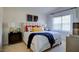 Bright bedroom with a queen bed and ensuite bathroom at 1133 Middlecrest Dr, Rocky Mount, NC 27804