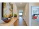 Bright hallway with wood-look floors, leading to other rooms at 1133 Middlecrest Dr, Rocky Mount, NC 27804