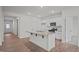 Modern kitchen with island, stainless steel appliances, and granite countertops at 1141 Middlecrest Dr, Rocky Mount, NC 27804