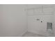 Bright laundry room with utility hookups and shelving at 1141 Middlecrest Dr, Rocky Mount, NC 27804