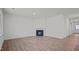 Living room featuring a corner fireplace and hardwood floors at 1141 Middlecrest Dr, Rocky Mount, NC 27804