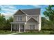 Two-story home with brick and siding, featuring a welcoming front porch at 1228 Hardin Hill Ln, Knightdale, NC 27545